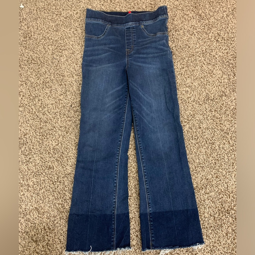 SPANX kick flare pull on shaping jeans.